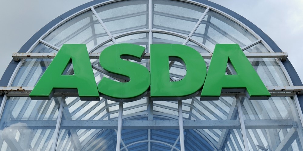 ASDA supermarket entrance with grey skies looming behind
