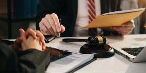 business people and lawyers discussing contract papers sitting at the table. Concepts of law, advice, legal services. in morning light