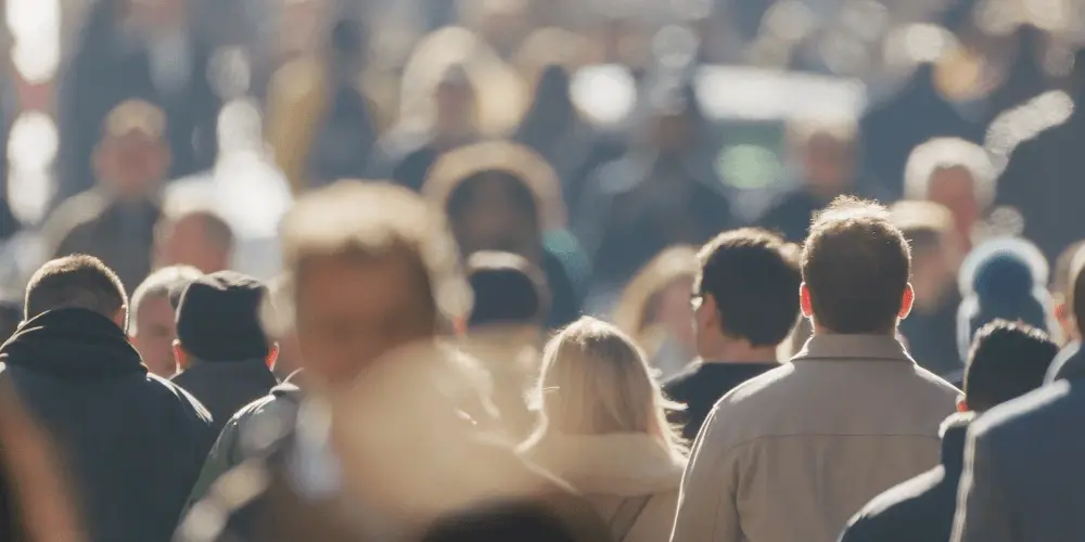 Blurred image of a crowd symbolising individuals united in a collective legal claim, representing the concept of class action UK and group litigation.