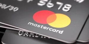 Close-up of a black Mastercard credit card, symbolising the £200 million Mastercard class action settlement over excessive transaction fees for UK consumers.