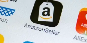 Amazon Seller application icon on Apple iPhone X screen close-up. Google AmazonSeller app icon.