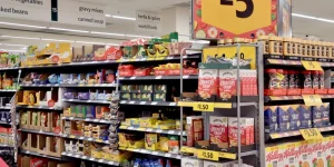 Interior of Morrisons supermarket, aisles of dry goods and cereals.