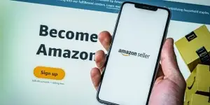 Amazon shopping application icon on Apple iPhone XS Max screen close-up. Amazon shopping app icon. Amazon mobile application.