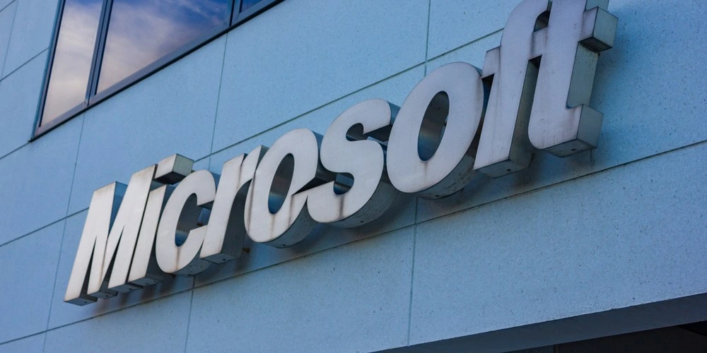 A picture of the Microsoft logo outside a building.