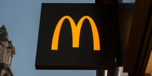 Street sign of McDonalds restaurant in Manchester UK