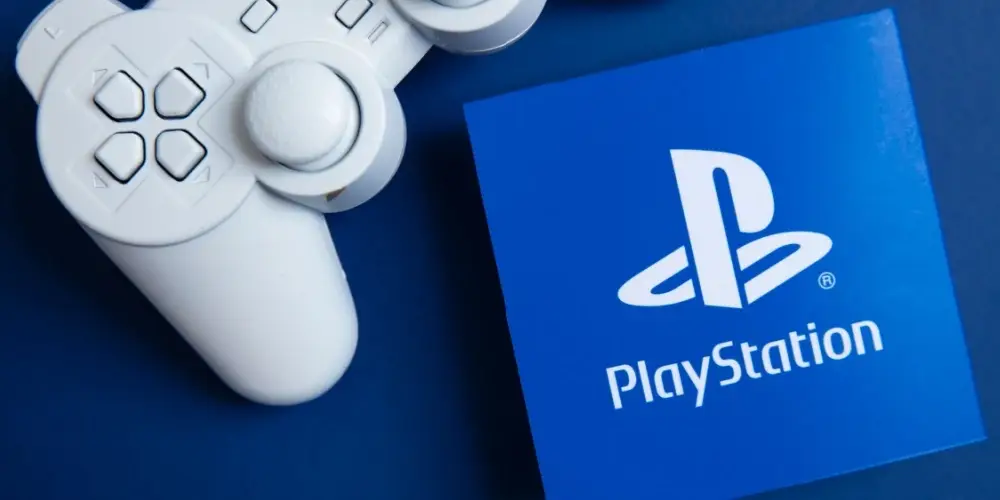 Sony playstation logo against a blue background. Playstation is a video game brand