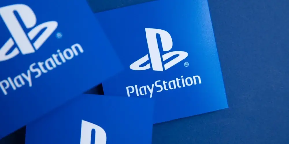 Sony playstation logo against a blue background. Playstation is a video game brand