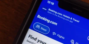 phone displaying booking.com app on screen