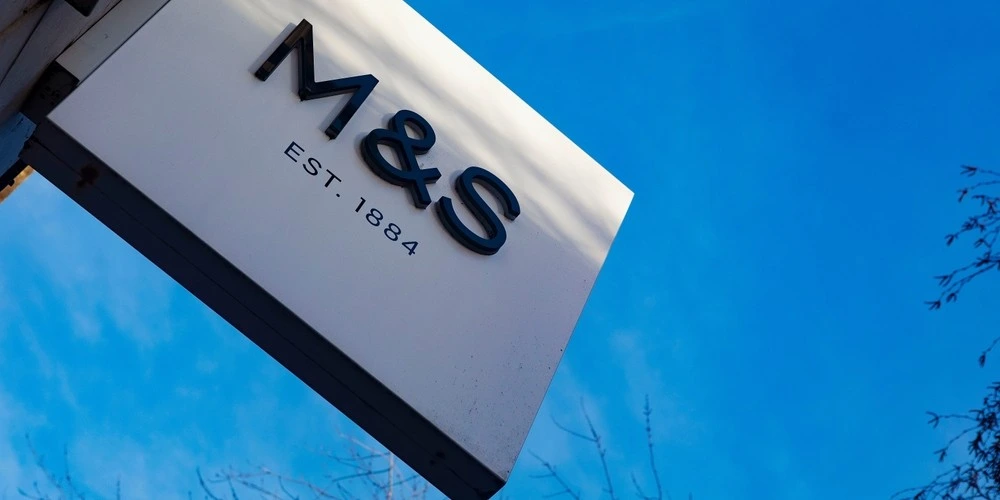 A Marks Spencer store sign. The British department store is a retail institution in the UK.