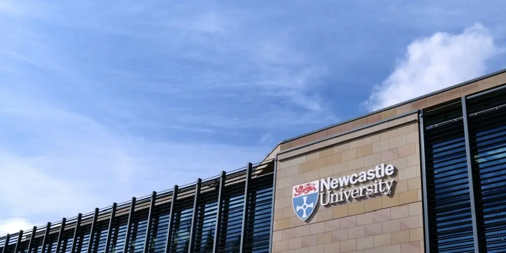 Newcastle University Kings Gate building, with univeristy logo