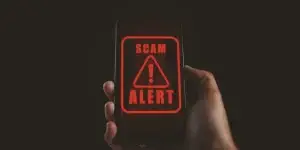 Man got scam alert. emergency system hacked alert. scam and cyber security concept.