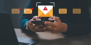 The concept of email alert dangers, scam alerts, showing cyber security risks and threats of data breaches, cybercrime, data protection